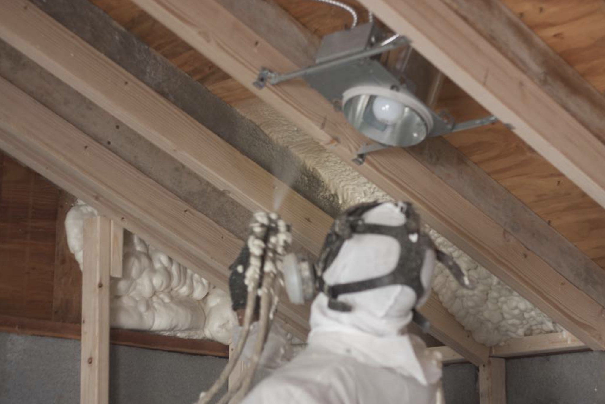 this image shows attic spray foam insulation in Vancouver, British Columbia